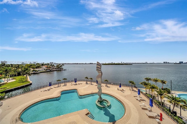 1800 NE 114th St Unit 604, Miami, FL 33181 - community pool featuring a patio and a water view