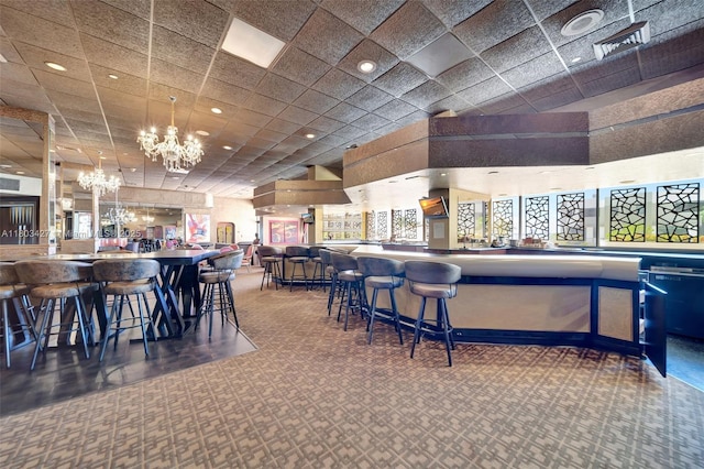 1800 NE 114th St Unit 604, Miami, FL 33181 - bar area with a chandelier, carpet flooring, recessed lighting, and pendant lighting