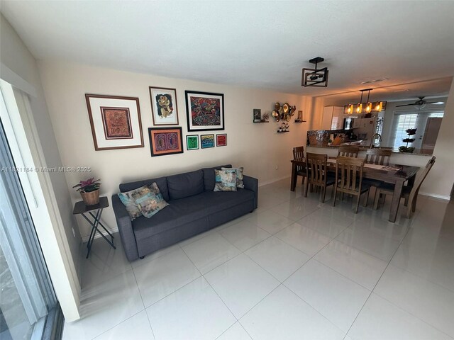 14251 SW 96th Ter Unit 14251, Miami, FL 33186 - living room featuring light tile patterned floors and ceiling fan