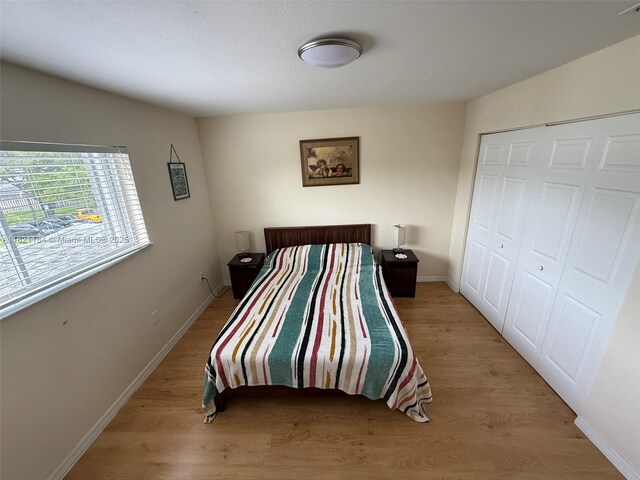 14251 SW 96th Ter Unit 14251, Miami, FL 33186 - bedroom with wood finished floors and a closet