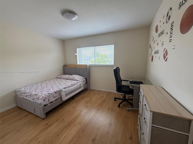 14251 SW 96th Ter Unit 14251, Miami, FL 33186 - bedroom featuring light wood-style floors and an office area