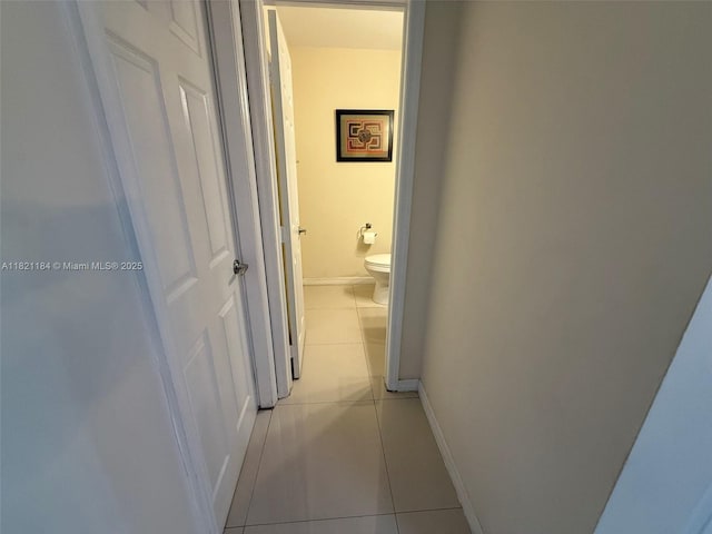 14251 SW 96th Ter Unit 14251, Miami, FL 33186 - hall with light tile patterned floors and baseboards