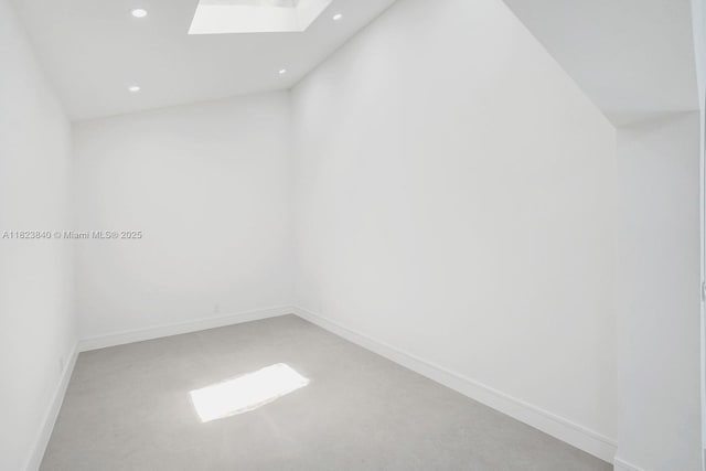 7340 Andorra Pl, Boca Raton, FL 33433 - spare room with a skylight, light carpet, and recessed lighting