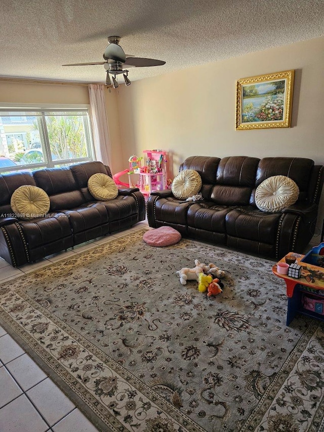 2423 NE 10th St Unit 154, Hallandale Beach, FL 33009 - tiled living area featuring a textured ceiling and a ceiling fan