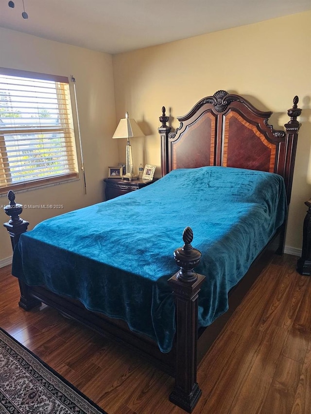2423 NE 10th St Unit 154, Hallandale Beach, FL 33009 - bedroom with wood finished floors and baseboards