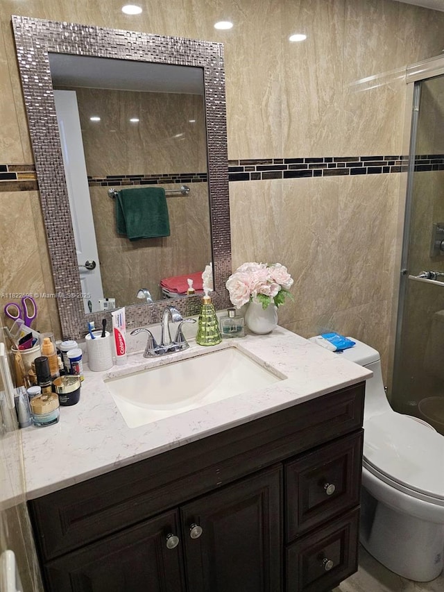 2423 NE 10th St Unit 154, Hallandale Beach, FL 33009 - full bathroom featuring vanity, tile walls, and a shower with door