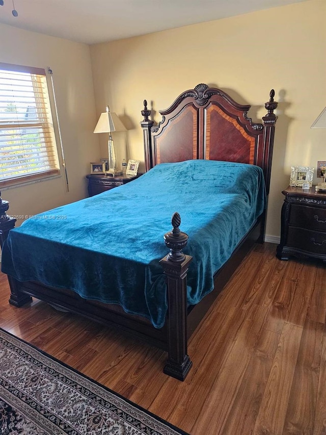 2423 NE 10th St Unit 154, Hallandale Beach, FL 33009 - bedroom featuring wood finished floors and baseboards