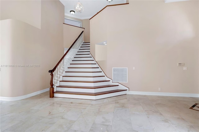 1020 NW 184th Ter, Pembroke Pines, FL 33029 - stairs with a towering ceiling, marble finish floors, and ornamental molding