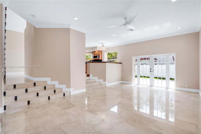 1020 NW 184th Ter, Pembroke Pines, FL 33029 - spare room featuring a ceiling fan, crown molding, recessed lighting, light marble finish floors, and french doors
