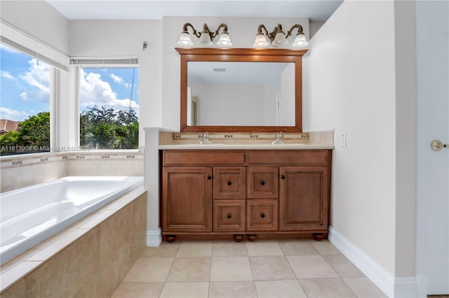 1020 NW 184th Ter, Pembroke Pines, FL 33029 - bathroom with double vanity, a garden tub, and tile patterned flooring
