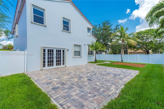 1020 NW 184th Ter, Pembroke Pines, FL 33029 - rear view of house with a patio area, stucco siding, and french doors