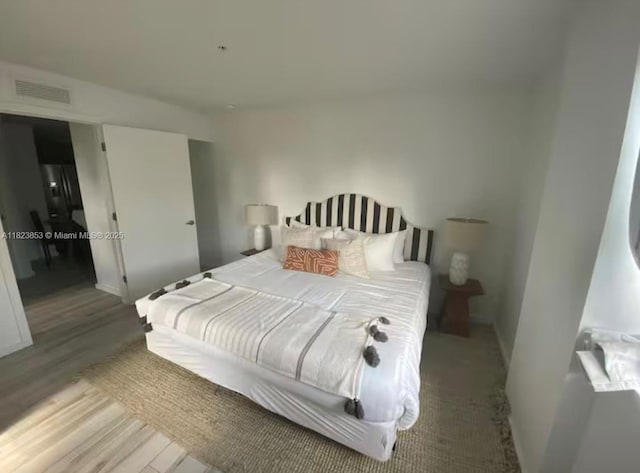 481 NE 29th St Unit 706, Miami, FL 33137 - bedroom with light wood-type flooring and baseboards
