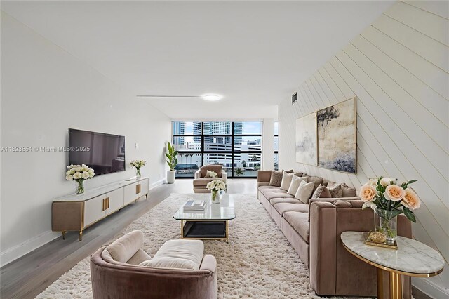 600 Parkview Dr Unit 624, Hallandale Beach, FL 33009 - living room with wood finished floors and a wall of windows