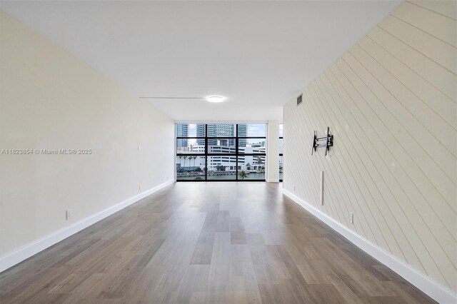 600 Parkview Dr Unit 624, Hallandale Beach, FL 33009 - unfurnished room featuring wood finished floors and floor to ceiling windows
