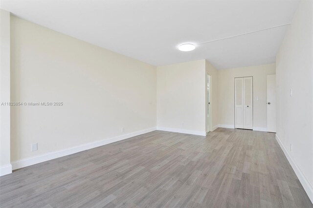 600 Parkview Dr Unit 624, Hallandale Beach, FL 33009 - empty room featuring light wood-type flooring and baseboards