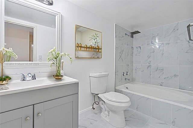 600 Parkview Dr Unit 624, Hallandale Beach, FL 33009 - bathroom featuring marble finish floors, vanity, and a combined bath / shower with marble appearance
