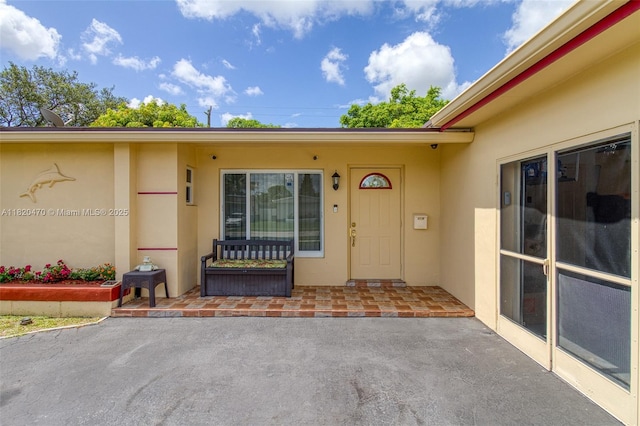 6530 NW 29th St, Sunrise, FL 33313 - entrance to property with stucco siding and a patio