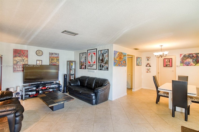 6530 NW 29th St, Sunrise, FL 33313 - living area with a chandelier, a textured ceiling, and light tile patterned floors