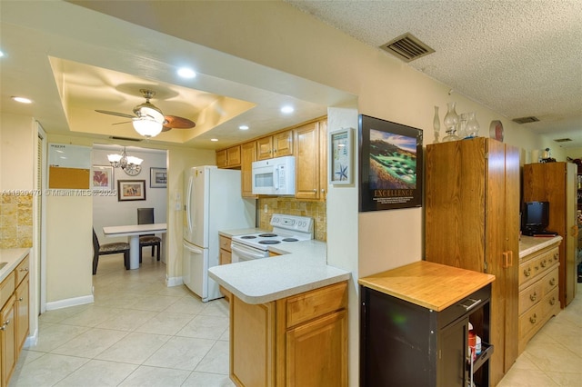 6530 NW 29th St, Sunrise, FL 33313 - kitchen featuring white appliances, light countertops, light tile patterned flooring, decorative backsplash, and recessed lighting