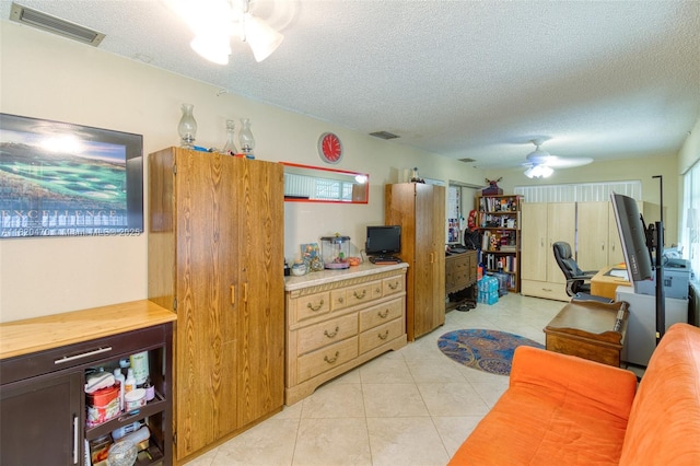 6530 NW 29th St, Sunrise, FL 33313 - office with a ceiling fan, a textured ceiling, and light tile patterned flooring
