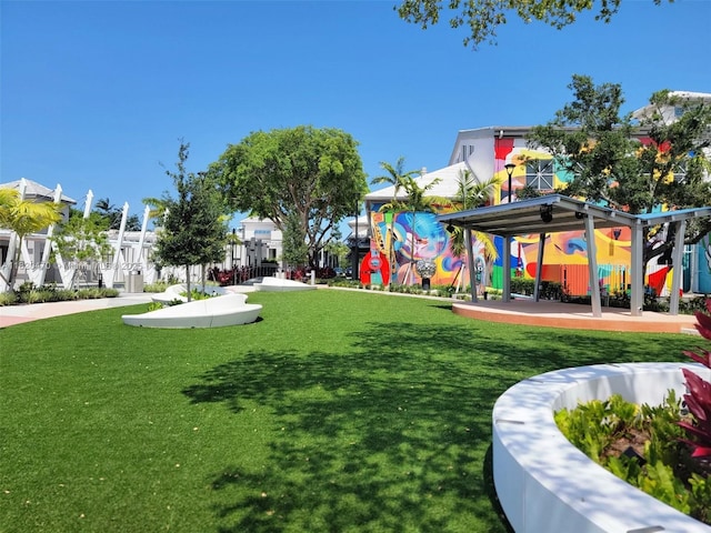 6530 NW 29th St, Sunrise, FL 33313 - view of property's community with a lawn