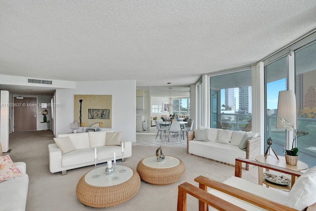 16400 Collins Ave Unit 544, Sunny Isles Beach, FL 33160 - living room with a textured ceiling and floor to ceiling windows