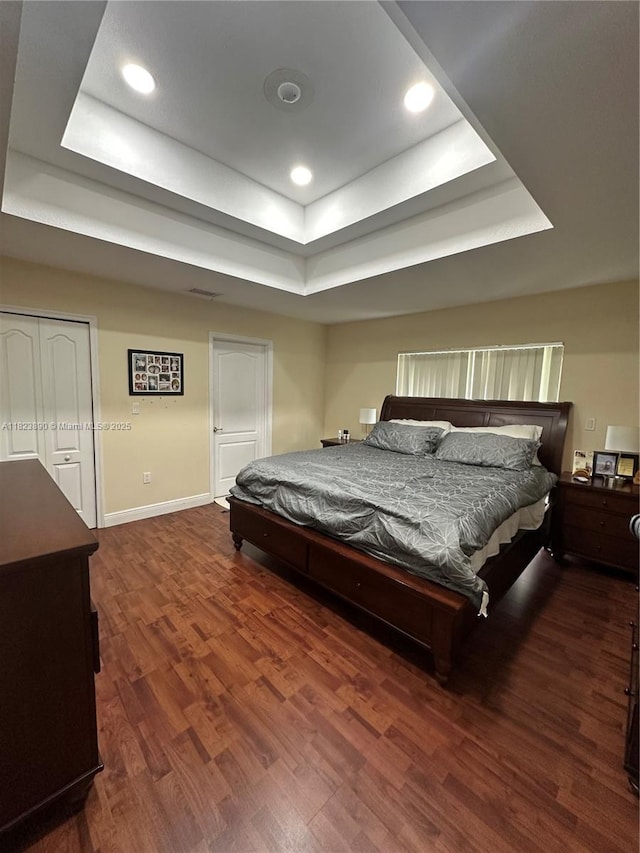 9860 SW 161st Ave, Miami, FL 33196 - bedroom with a tray ceiling, dark wood-style floors, and recessed lighting