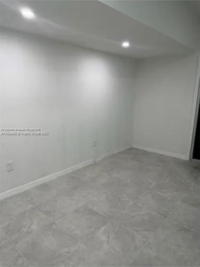 9860 SW 161st Ave, Miami, FL 33196 - spare room with recessed lighting and baseboards
