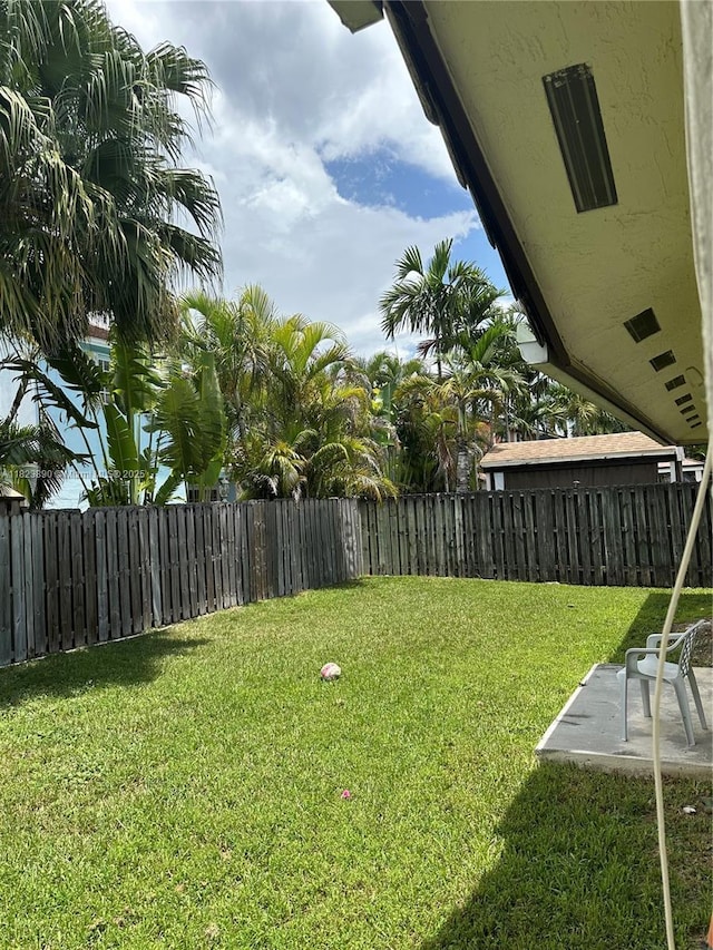 9860 SW 161st Ave, Miami, FL 33196 - fenced backyard featuring a patio area