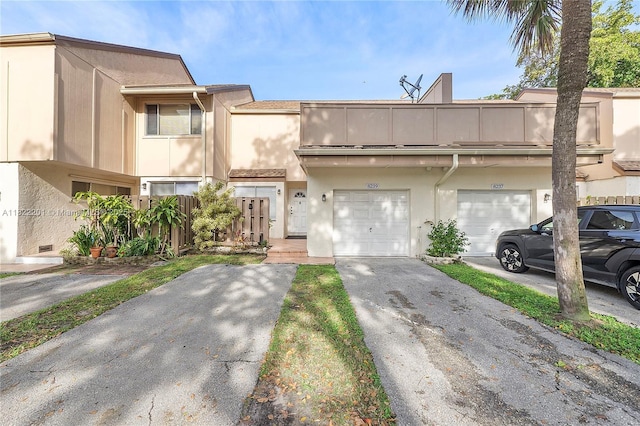 8239 NW 8th St Unit 3, Plantation, FL 33324 - multi unit property featuring driveway, an attached garage, and stucco siding