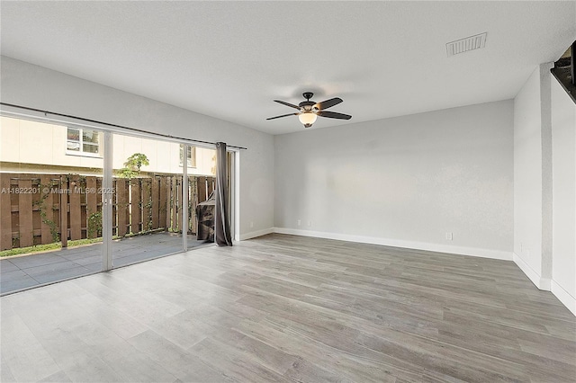 8239 NW 8th St Unit 3, Plantation, FL 33324 - empty room with ceiling fan and wood finished floors