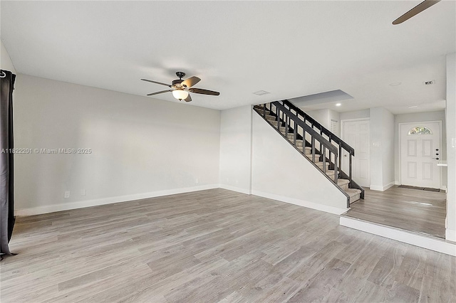 8239 NW 8th St Unit 3, Plantation, FL 33324 - unfurnished living room with a ceiling fan, stairs, wood finished floors, and recessed lighting