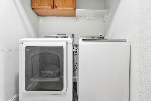 8239 NW 8th St Unit 3, Plantation, FL 33324 - laundry room featuring cabinet space and washer and dryer