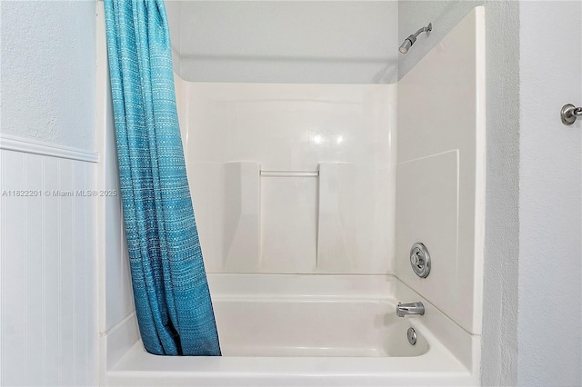8239 NW 8th St Unit 3, Plantation, FL 33324 - bathroom with shower / bath combo and a textured wall
