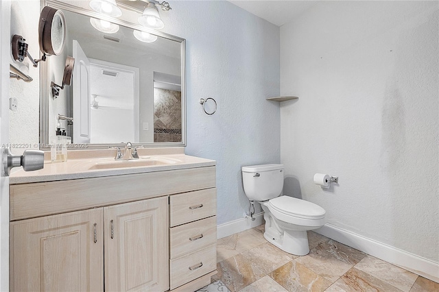 8239 NW 8th St Unit 3, Plantation, FL 33324 - bathroom with vanity, a textured wall, and ceiling fan