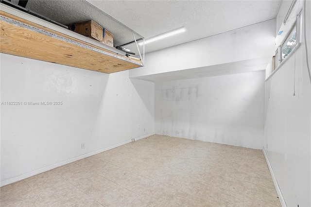 8239 NW 8th St Unit 3, Plantation, FL 33324 - below grade area featuring a textured ceiling