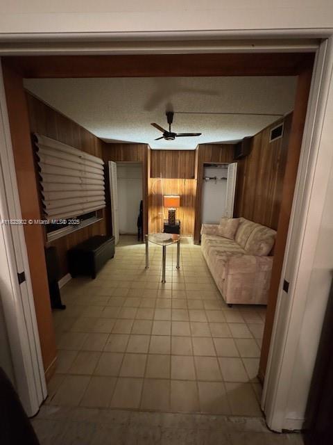 13648 Coconut Palm Ct Unit C, Delray Beach, FL 33484 - living room featuring wooden walls