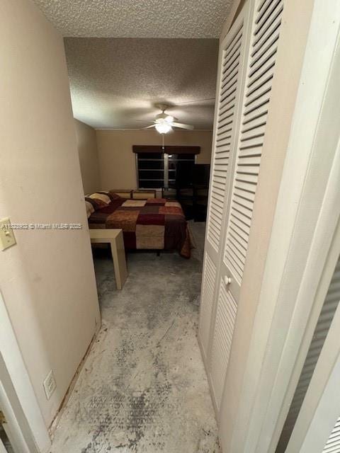 13648 Coconut Palm Ct Unit C, Delray Beach, FL 33484 - hall featuring a textured ceiling and concrete floors