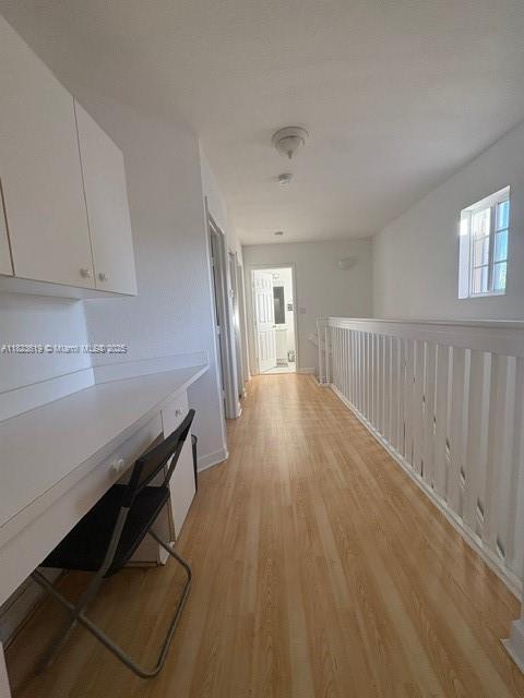 13933 SW 155th Ct, Miami, FL 33196 - corridor featuring light wood finished floors and baseboards