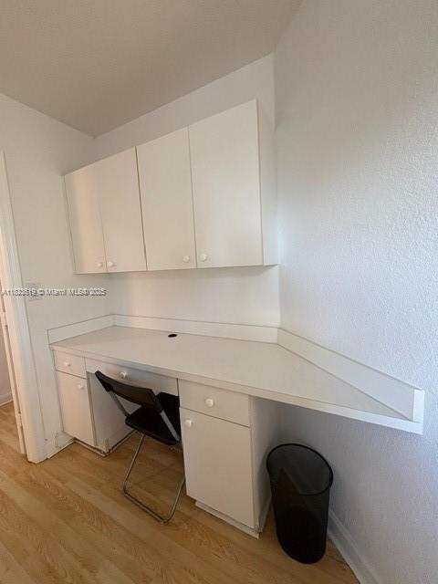 13933 SW 155th Ct, Miami, FL 33196 - unfurnished office with built in desk and light wood-type flooring