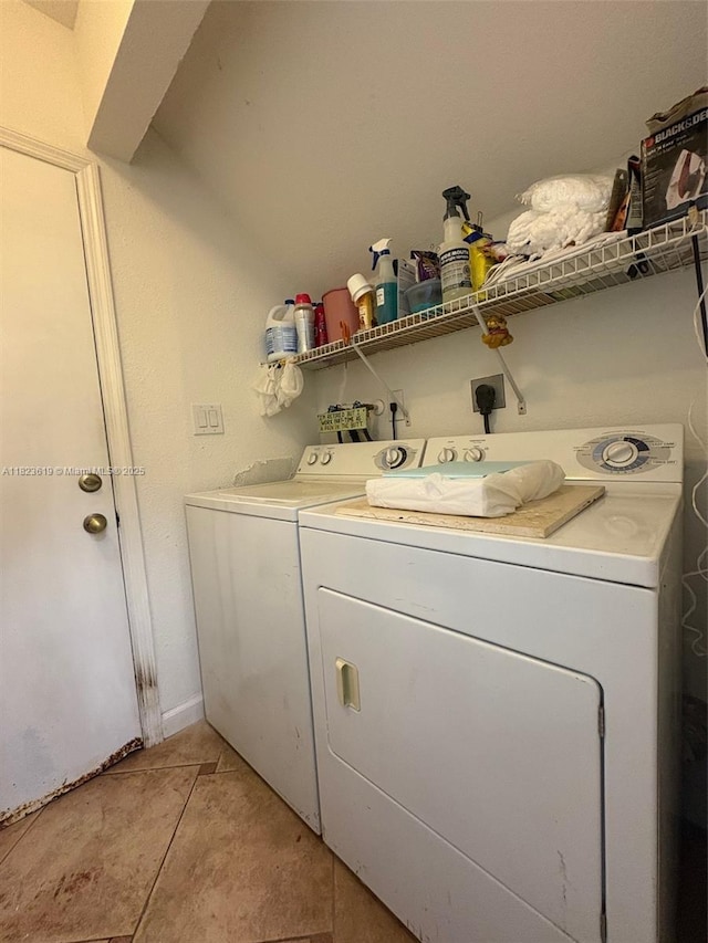 13933 SW 155th Ct, Miami, FL 33196 - washroom featuring separate washer and dryer and light tile patterned floors
