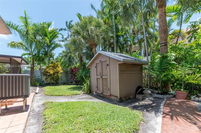 9064 Garland Ave, Surfside, FL 33154 - view of yard with a storage unit