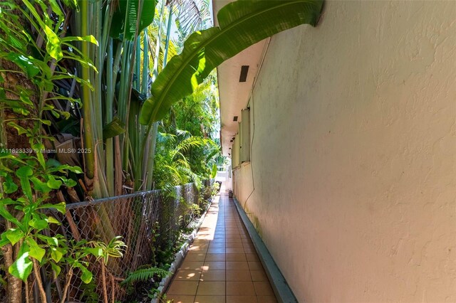 9064 Garland Ave, Surfside, FL 33154 - view of side of property featuring stucco siding