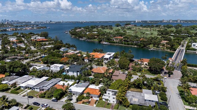 9064 Garland Ave, Surfside, FL 33154 - aerial overview of property's location with a nearby body of water and nearby suburban area