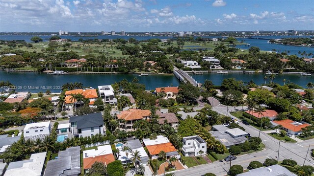 9064 Garland Ave, Surfside, FL 33154 - aerial overview of property's location featuring a nearby body of water and nearby suburban area