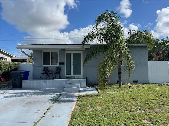 6413 Franklin St, Hollywood, FL 33024 - view of front facade featuring a porch and stucco siding