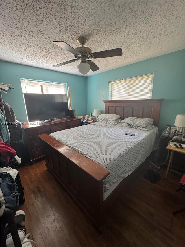 6413 Franklin St, Hollywood, FL 33024 - bedroom featuring hardwood / wood-style flooring, a textured ceiling, and a ceiling fan