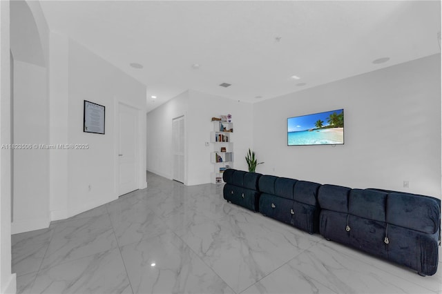 4445 SW 160th Ave Unit 102, Miramar, FL 33027 - unfurnished living room with marble look tile flooring and recessed lighting
