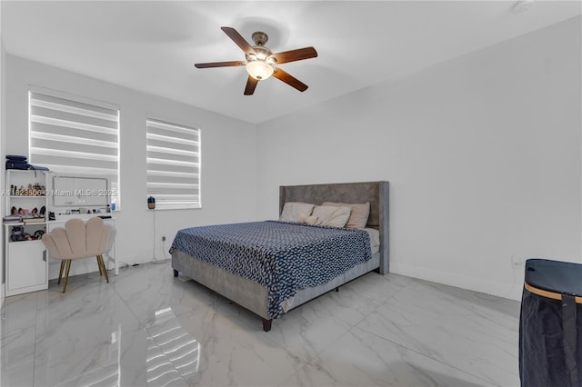 4445 SW 160th Ave Unit 102, Miramar, FL 33027 - bedroom featuring marble look tile flooring and a ceiling fan