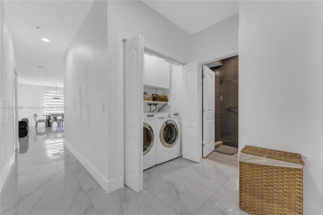 4445 SW 160th Ave Unit 102, Miramar, FL 33027 - laundry area with light marble finish flooring and independent washer and dryer